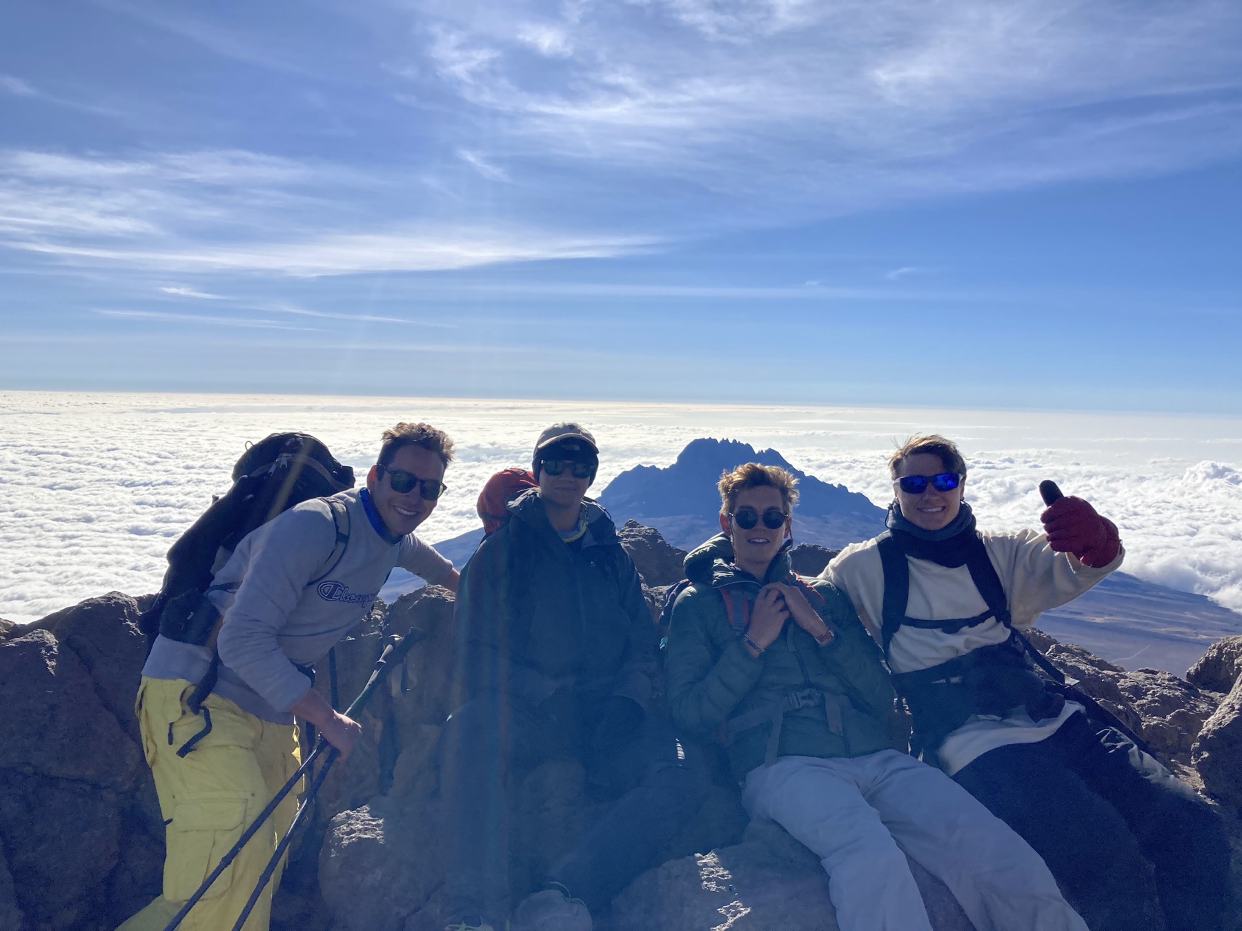 Angelo and friends on Kilimanjaro above the clouds
