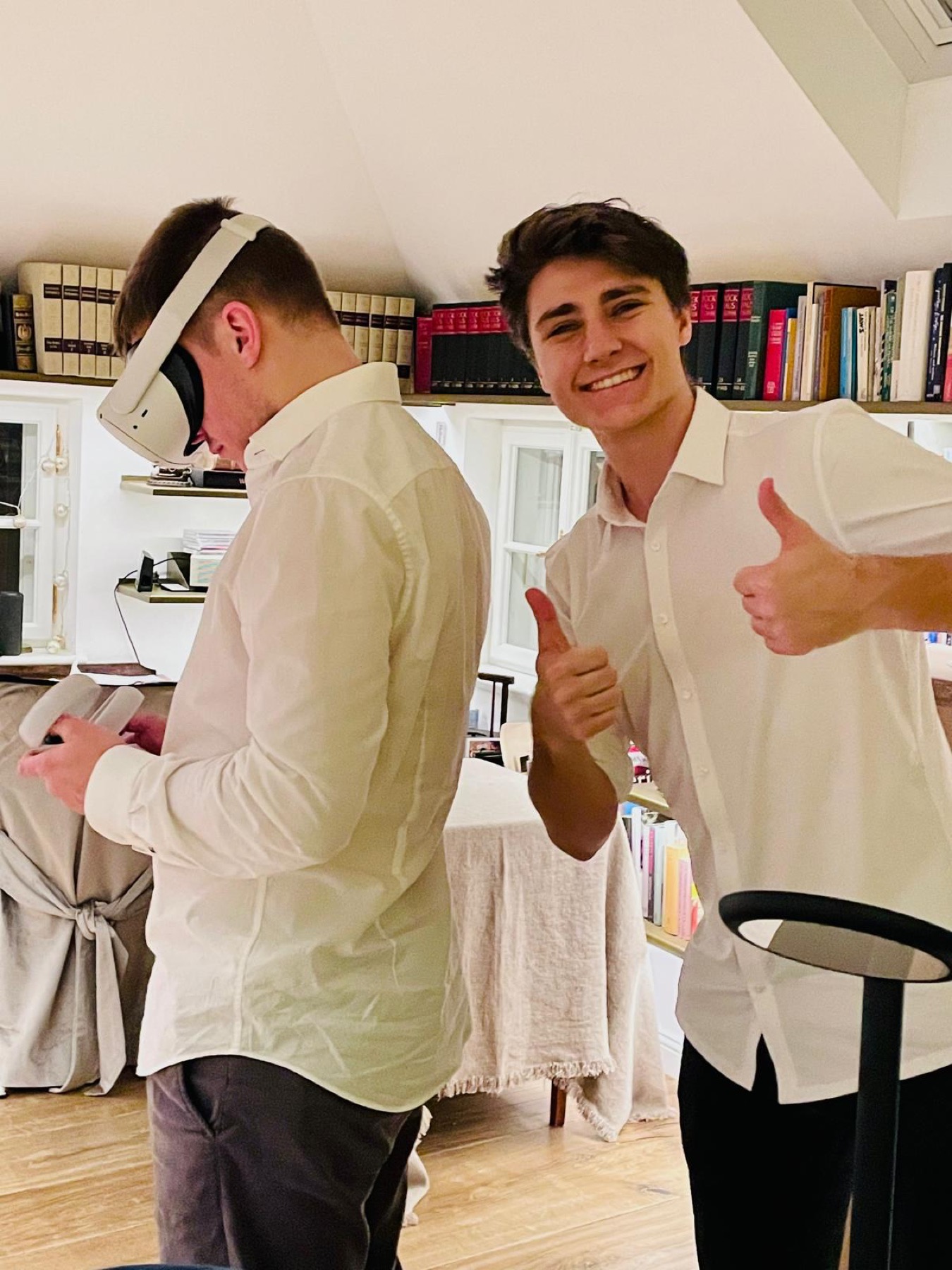 Angelo smiling beside a VR demo